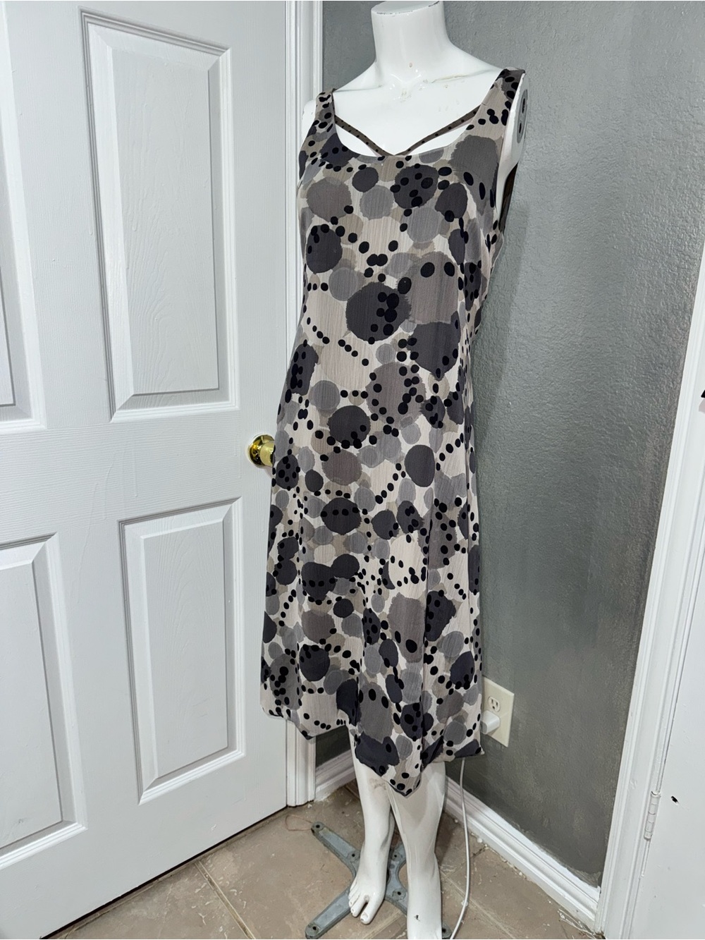 Moloko Sleeveless Printed Midi Dress in Gray and Black
Brand Moloko